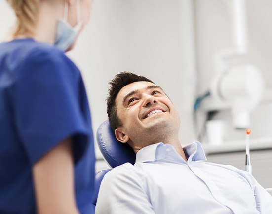 Frisco patient smiling after dental implant care