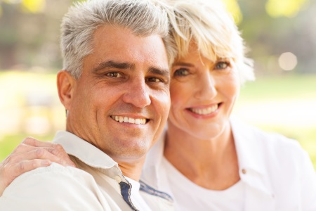 How to decide between Dental Implants and Veneers